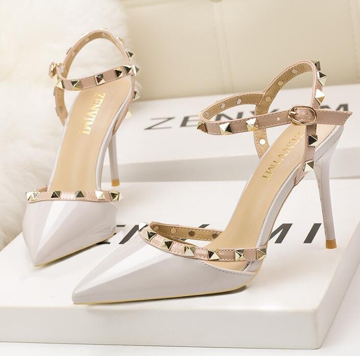 Roman fashion rivet sandals 10CM PUMPS Woman shoes Sexy nightclub stiletto heels patent-leather metallic rivet hollow