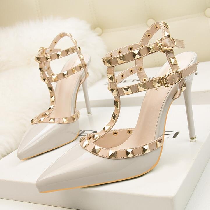 Roman fashion rivet sandals 10CM PUMPS Woman shoes Sexy nightclub stiletto heels patent-leather metallic rivet hollow