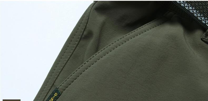 New 2020 Men Winter Thick Warm Cargo Pants Casual Fleece Pockets Long Trousers Fashion Loose Baggy Jogeer Worker Male Pants 4XL New 2020 Men Winter Thick Warm Cargo Pants Casual Fleece Pockets Long Trousers Fashion Loose Baggy Jogeer Worker Male Pants 4XL