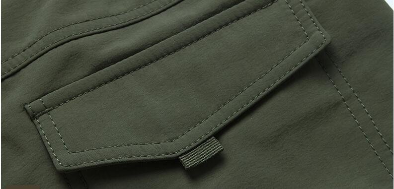 New 2020 Men Winter Thick Warm Cargo Pants Casual Fleece Pockets Long Trousers Fashion Loose Baggy Jogeer Worker Male Pants 4XL New 2020 Men Winter Thick Warm Cargo Pants Casual Fleece Pockets Long Trousers Fashion Loose Baggy Jogeer Worker Male Pants 4XL